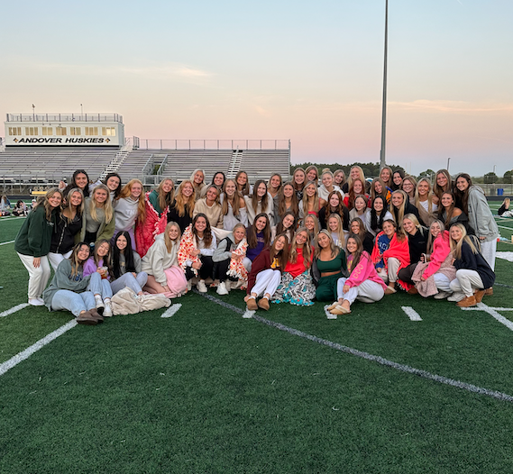  Students enjoy sunrise on football field